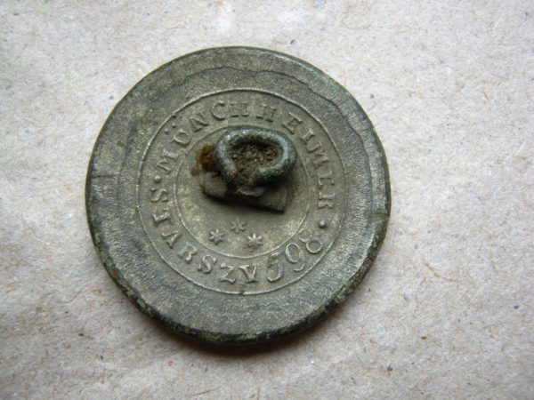 vintage button engraved on the backward